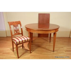 A walnut Directoire style round table and four chairs, circa…