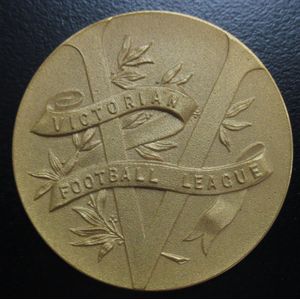 Collingwood: Len Thompson's School Champion medal, front with…