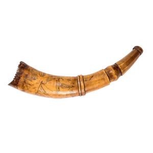 A scrimshaw powder horn engraved with a tallship and kangaroo…