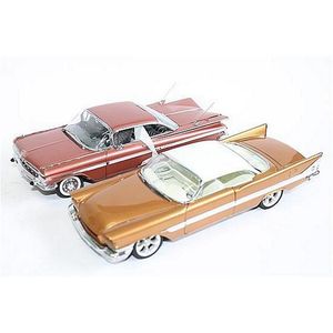 Two Danbury Mint models, '1957 Chrysler 300C' and '1959 Impala…