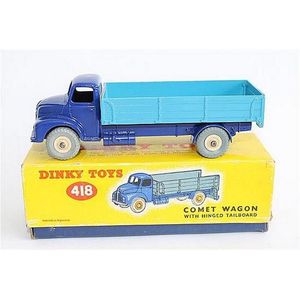 A Dinky Toys 'Comet wagon with hinged Tailboard', dark and…