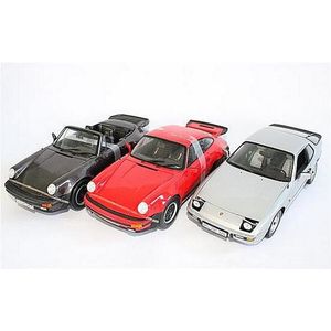 Two Norev 'Porsche 911 Turbo' models, and a Minichamps 'Porsche…