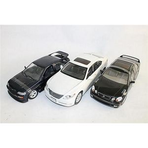An Autoart 'Lexus Gs 400', a Ut models 'Ford Escort', and a…