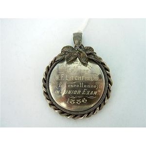 A Victorian silver fob medallion, 'Newington College, 1886'.