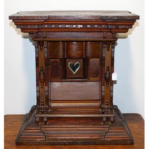 An unusual colonial mottled kauri jewellery cabinet with dentil…