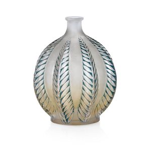 A Rene Lalique Malines vase, designed 1924, the bottle shaped…