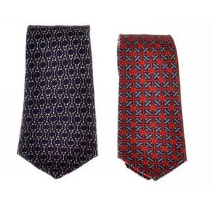 Two silk ties by Hermes, styled with silver horse bits on a&hellip;
