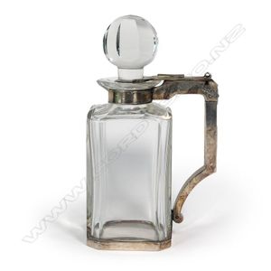 A. W.M.F. silver plate lockable decanter, with handle, ostrich…