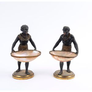 A pair of Blackamoor figural bonbon dishes, cold painted…