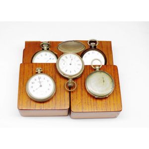 Four fob watches and a compass includes a base metal Westclox…