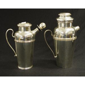 Two silver plate cocktail shakers one with no stopper, height…