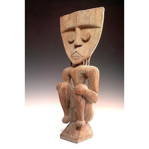 A Dayak seated ancestor figure, large round eyes, straight nose&hellip;