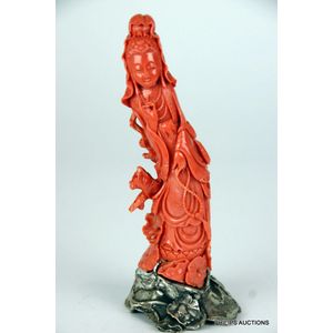 A salmon coral figure of a guanyin, with natural fissures and&hellip;