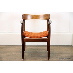 A teak Parker armchair, 1950s/60s, with a curved back rail,…