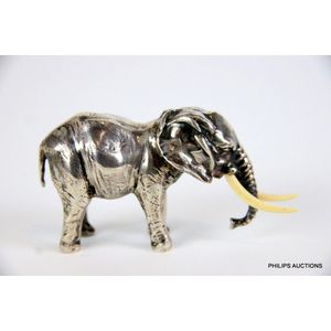 A silver elephant, early 20th century, with single letter mark,…