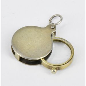 A magnifying glass, sterling silver, London 1979. Diameter 15…