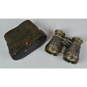 A sterling silver mount and brass pair binoculars hallmarked…