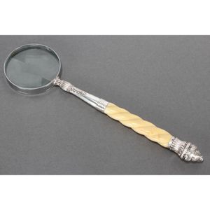 Sterling silver and whale bone carved magnifying glass, with…