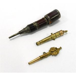 Three novelty propelling pencils in the form of an eyeglass…