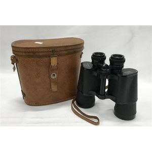 A pair of Zodiac 20x50 binoculars in original leather case,…