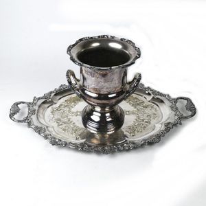 A silver plated wine cooler, of two-handled campana shape.…