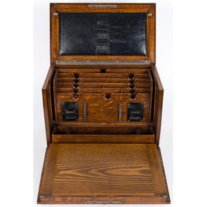 An English oak compendium with fold out writing slope, late…