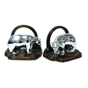 A pair of Art Deco bronze and chromed polar bear bookends, the…