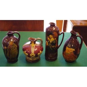 Four Royal Doulton Dewars whisky flasks, tallest 25 cm, a/f