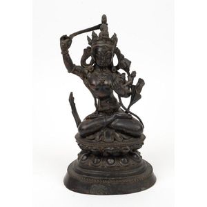 An antique Tibetan bronze seated Tara on double lotus base, 28&hellip;