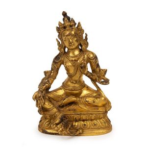 An antique Tibetan gilt bronze green tara figure, wearing a&hellip;