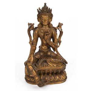 An antique Sino-Tibetan green Tara bronze figure seated on a&hellip;