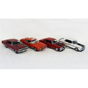 Four various models, including Danbury Mint 1969 Pontiac Gto…