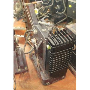 An Austrian Enmig projector, 35 cm high, 30 cm wide.