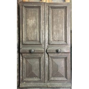 A pair of panelled oak entrance doors 230 cm high, 138 cm wide