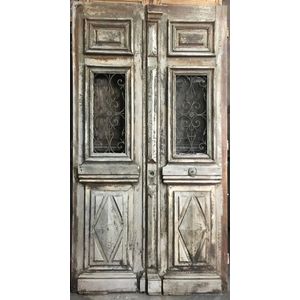 A pair of stained pine entrance doors (diamond panels) wrought…