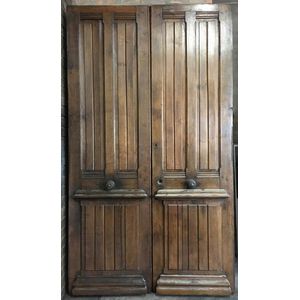 A pair of polished oak entrance doors 250 cm high, 142 cm wide