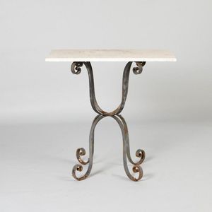 A small outdoor table, distressed black paintwork, unpolished…