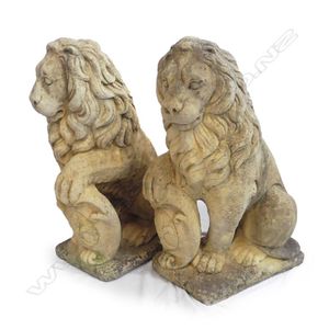 A pair of classical Church Stone seated 'Westcott Lions',…