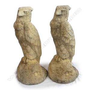 A pair of Church Stone Highland eagles garden statues, stern…