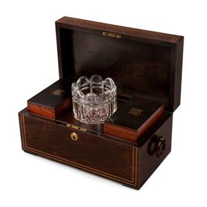 A Regency brass inlaid rosewood tea caddy, circa 1830, the…