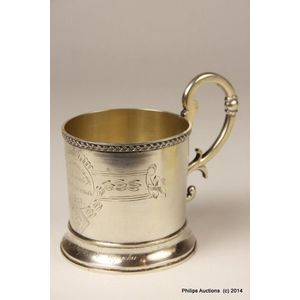 A Russian silver tea glass holder, early 20th century, with…