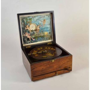 A Polyphon 8 ¼ inch disc type musical box c.1900, mahogany case…