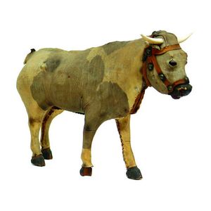 A mid-19th century vellum covered carved wood child's toy bull,…