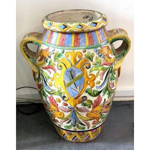 An Italian Majolica tall twin handle floor urn with floral ...