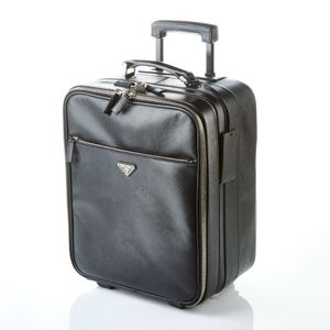A Prada black Saffiano suitcase. Features black saffianoleather…