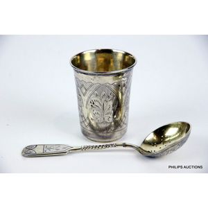 A Russian.875 silver beaker and sifter spoon, 1882- 1899,…