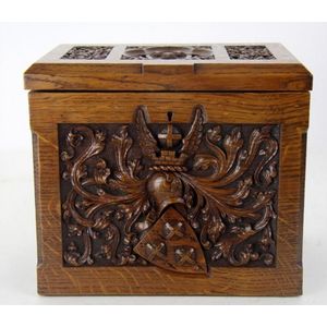 A 19th century tea caddy. Carved oak, with two divisions. 18 cm…