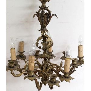 A French gilt metal rococo style electrolier, the column and…