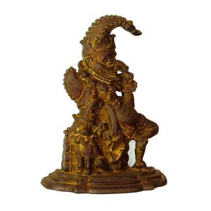 An old cast iron Mr. Punch door stop, the cast figure with…