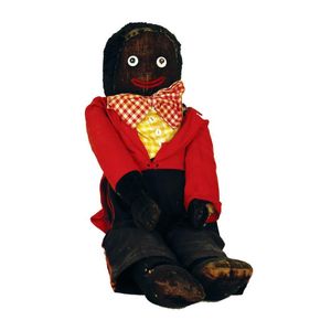 An unusually large vintage golliwog, black velvet with bead and…